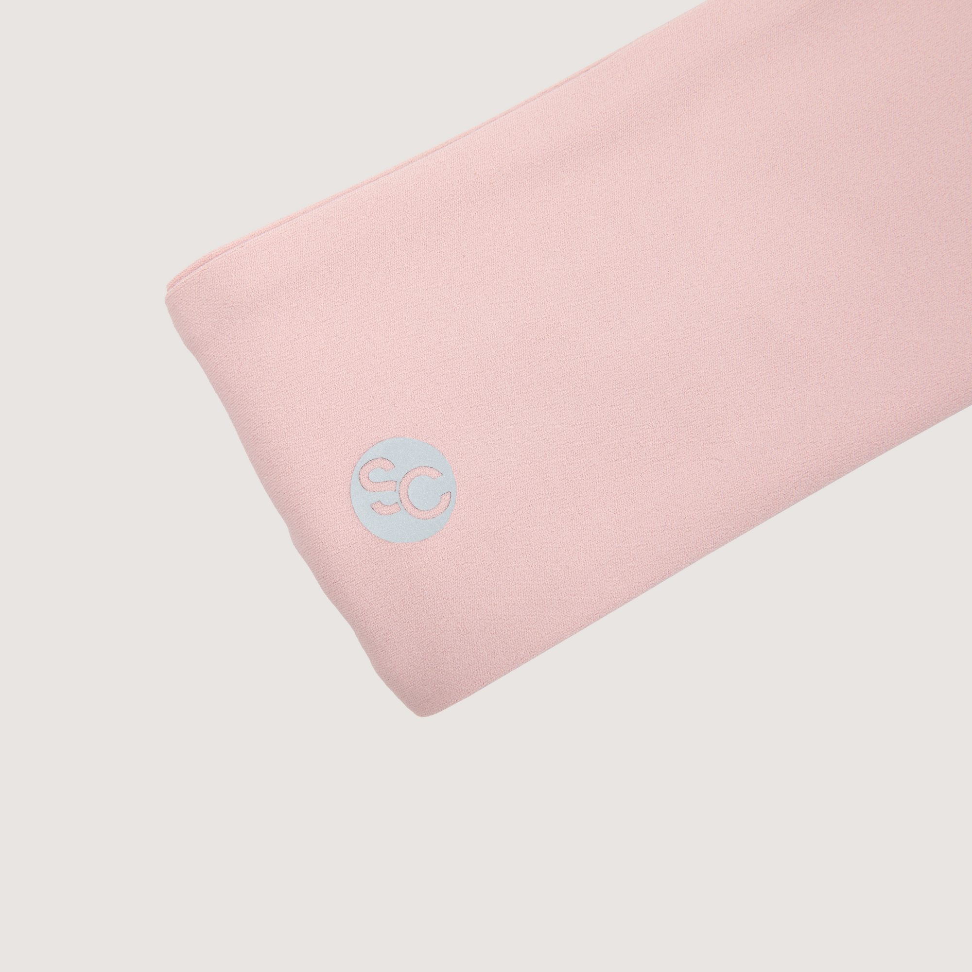 Pink fabric with a Strawberries and Cream logo on a light gray background