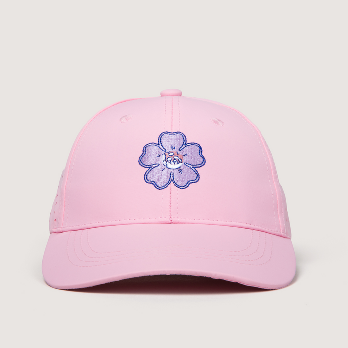 Pink cap with a purple floral design on a light gray background