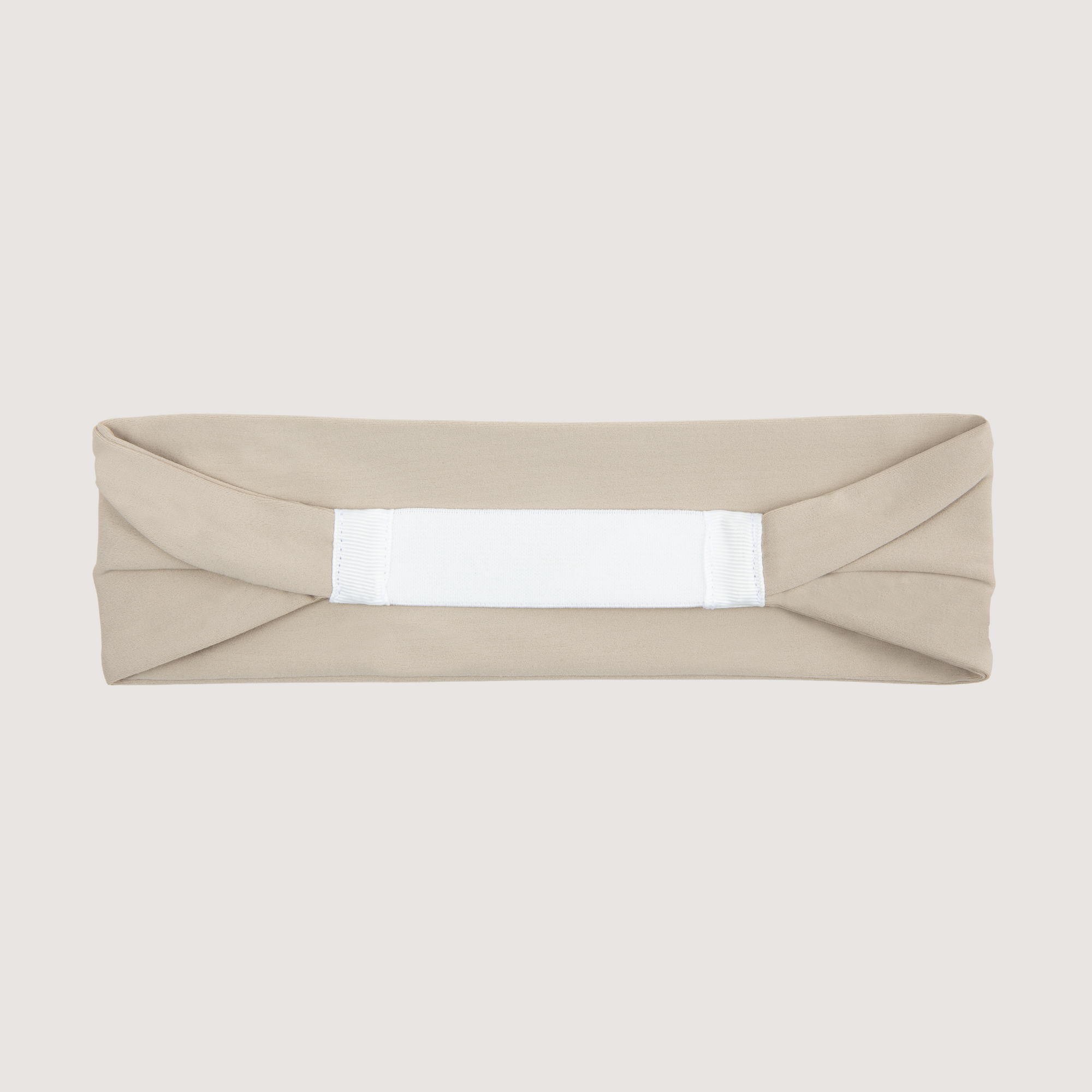 Backside of the wide tennis headband with white elastic band to stay in place.