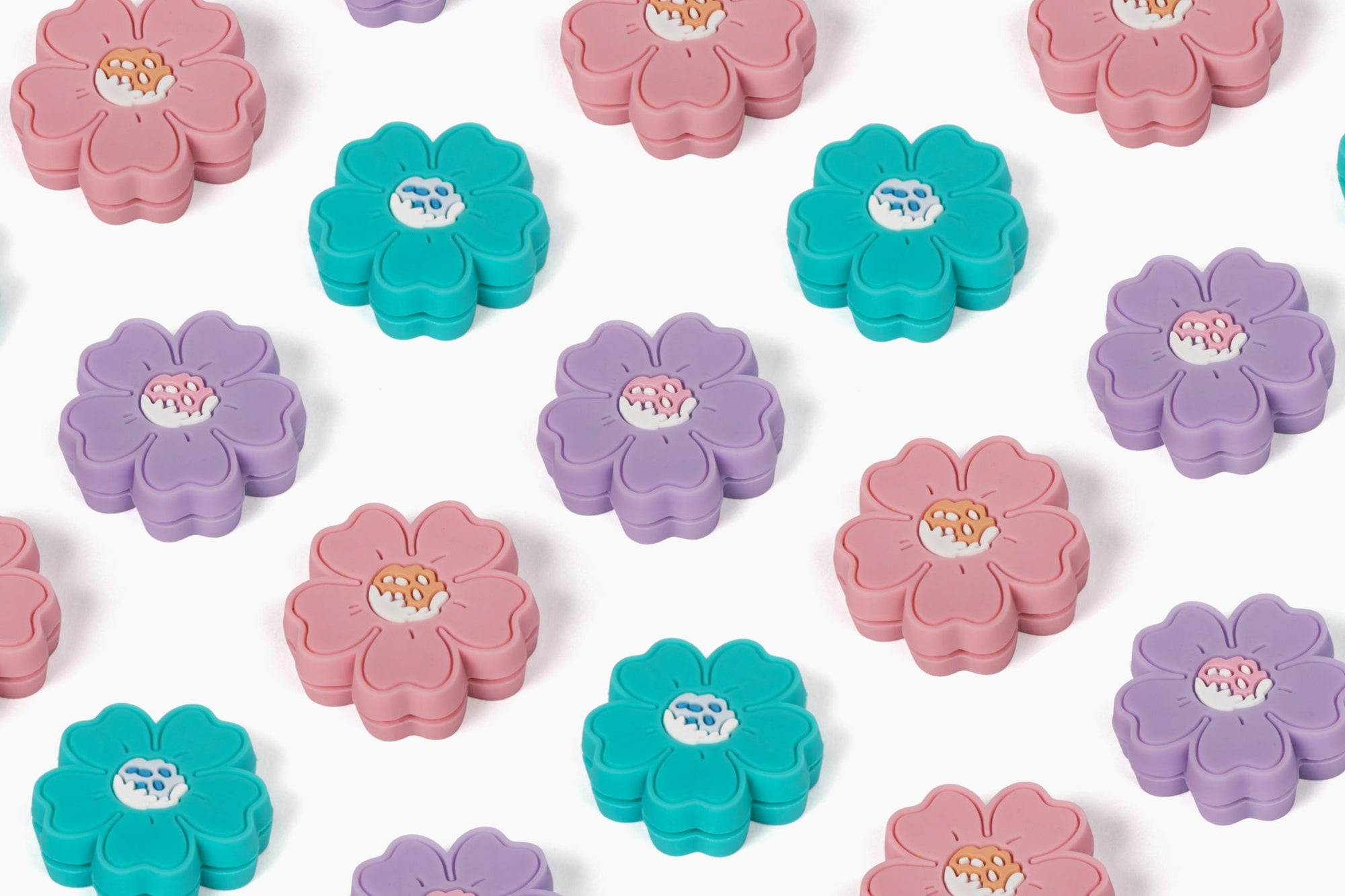Tennis dampener patterns - pink, purple turquoise.